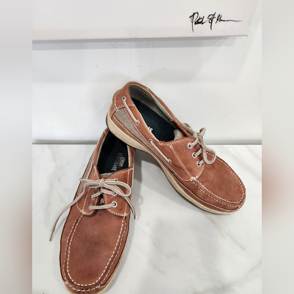 [ Chaps] men's size 12, tan boat shoes with cream colored soles.